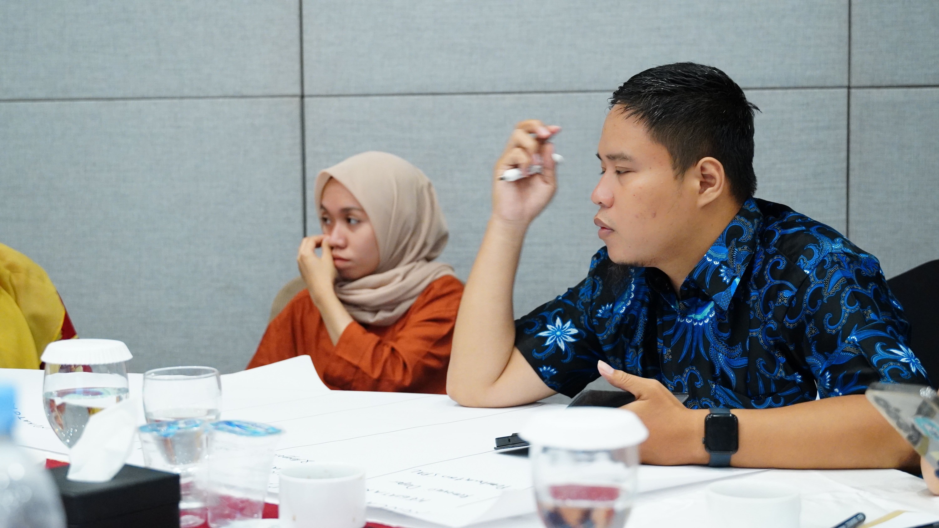 Participant presenting completed wall of insights