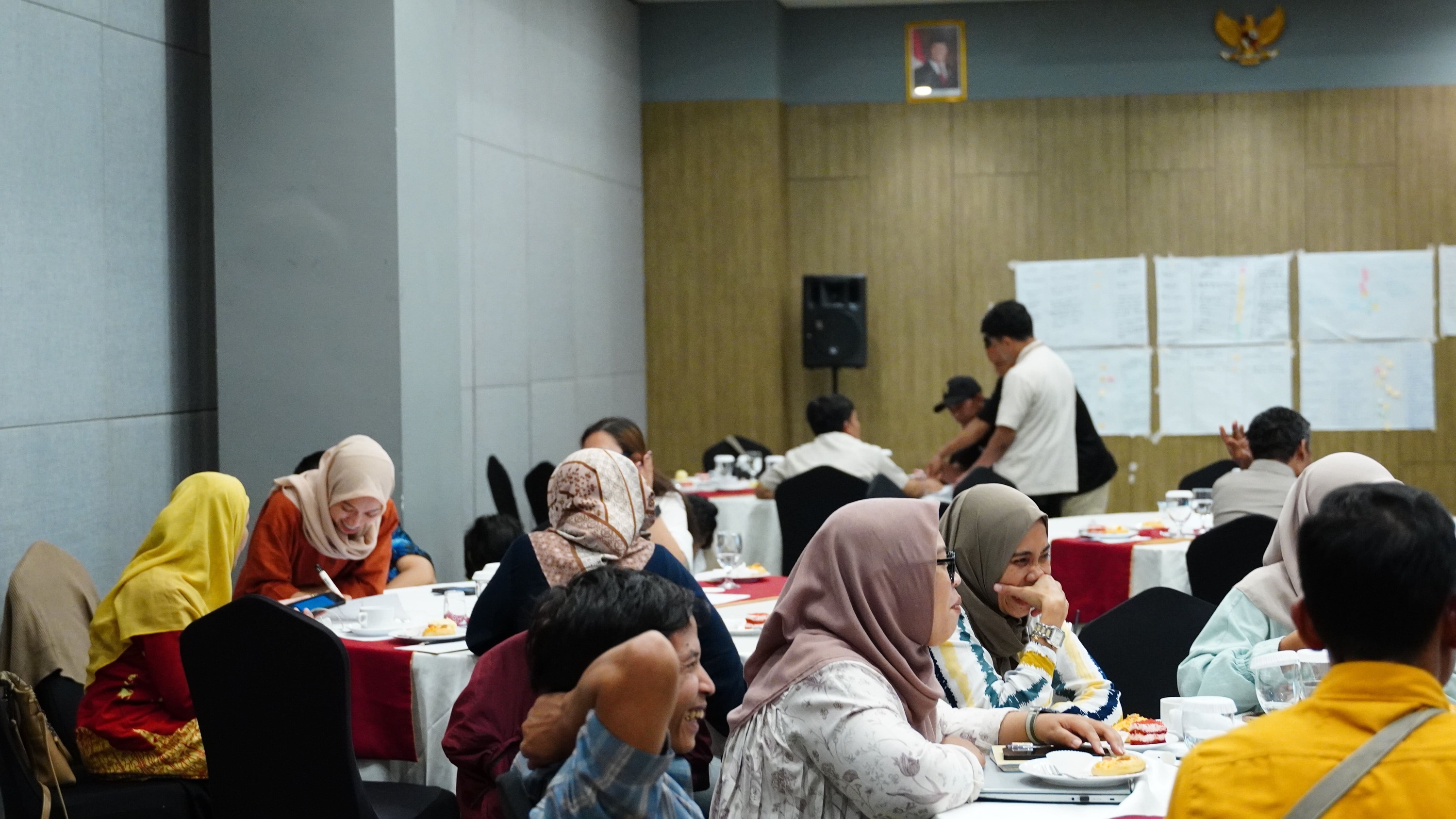 Participants sketching action plans together