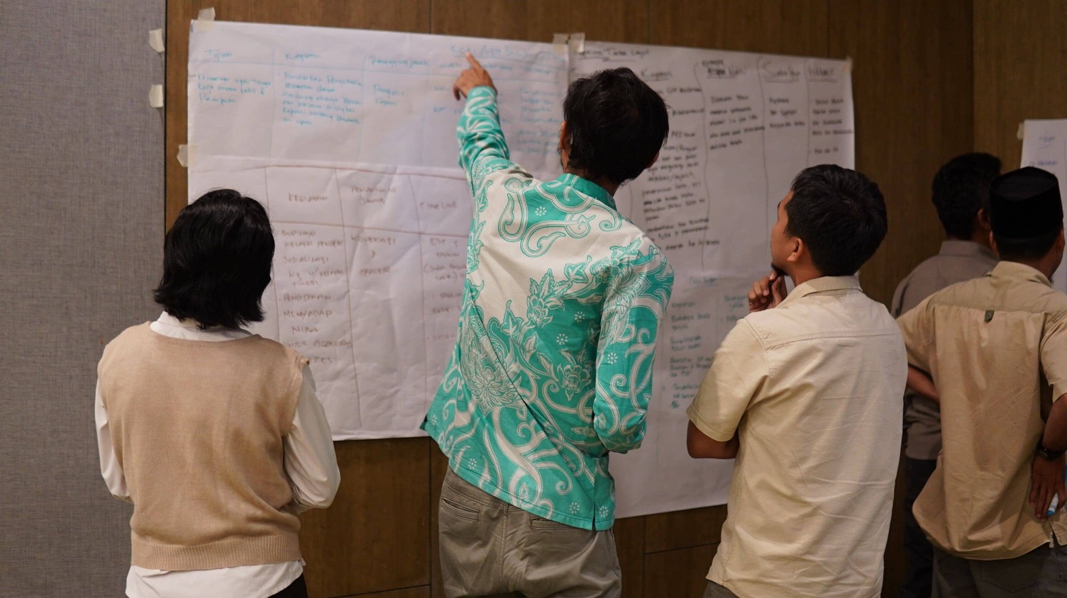 Participants listening attentively to inputs